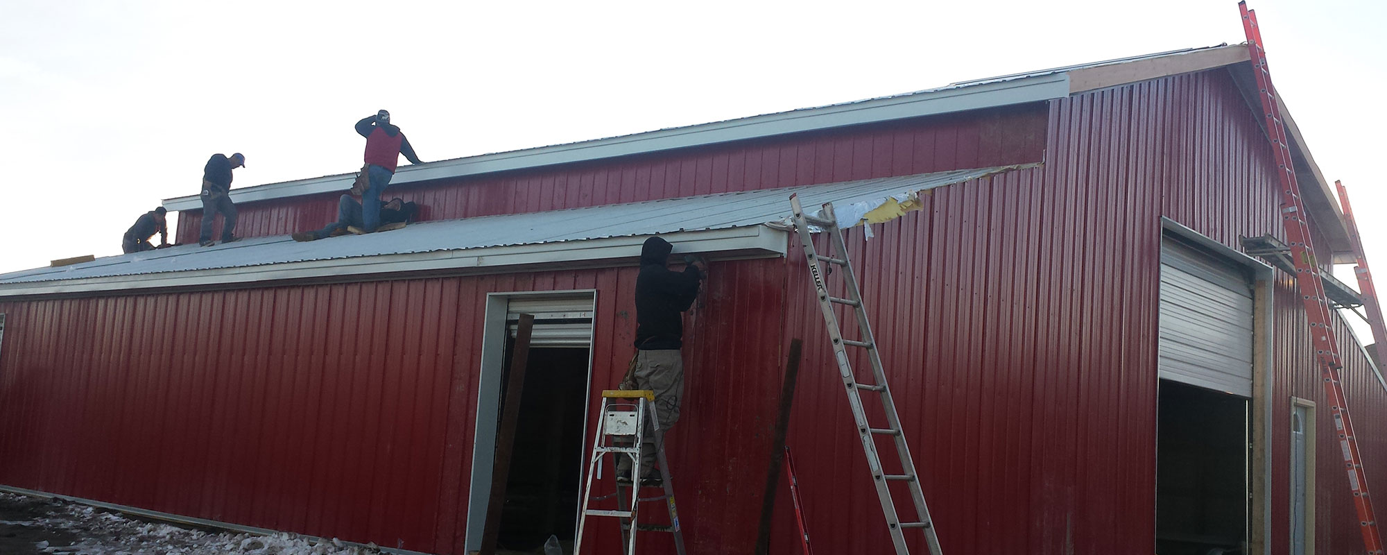 People Remodeling Barn